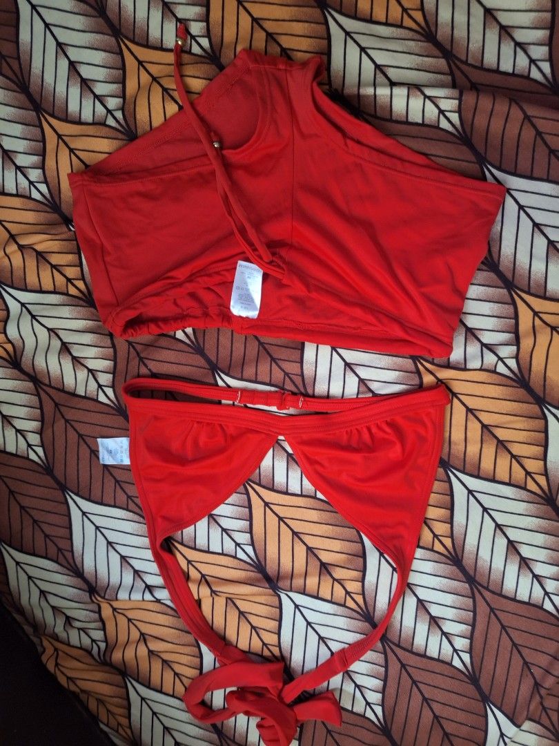 H&M Red Bikini Set Size EUR 38 US 8 (Category: Bikinis & Swimsuits) located in Manila. Submitted by bitna44 (Listing ID 1468562751, Image 1). Description: - Brand: H&M - Color: Bright red - Size: EUR 38 / US 8 (tags attached) - Set includes: Halter neck top and high-waisted bottoms - Details: Adjustable back straps on top; adjustable drawstring sides with metal beads on bottoms - Condition: Brand new, ready for the beach or pool.