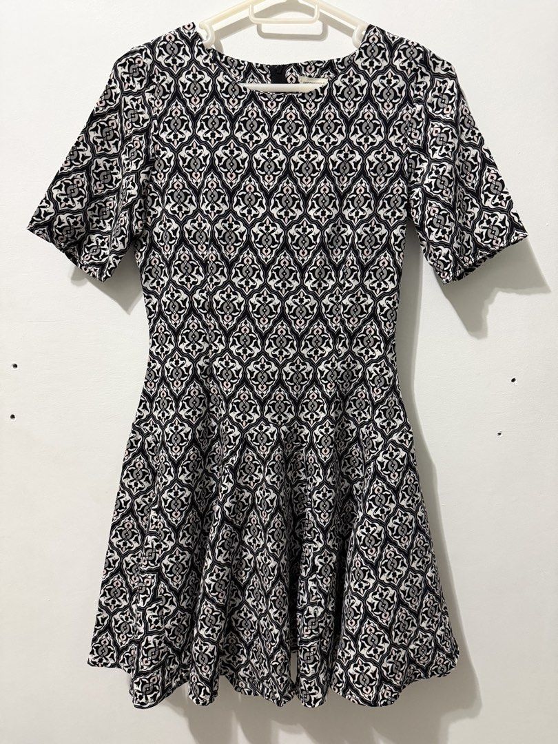 H&M Skater Dress (Category: Dresses) located in Malolos. Submitted by eadiana (Listing ID 1468570949, Image 1). Description: - Brand: H&M Conscious Collection - Size: EUR 34 / US 4 / CN 160/80A - Color/Pattern: Black, white, and pink intricate damask print - Design: Short sleeves with button cuffs, fitted waist, and flared skirt - Closure: Convenient back zip closure - Condition: Great piece for casual outings or dressing up - Lightweight and com
