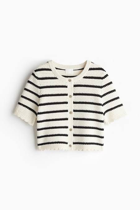 H&M Striped Cropped Knit Cardigan (Category: Coats, Jackets and Outerwear) located in Makati City. Submitted by andrae.thomas (Listing ID 1468684593, Image 2). Description: - Brand: H&M - Style: Cropped cardigan with classic cream and black stripes - Size: XL - Details: Short sleeves, round neckline, front button closure, textured knit fabric - Special Features: Charming scalloped hem and cuffs - Condition: Excellent, clean with no flaws noticed 
