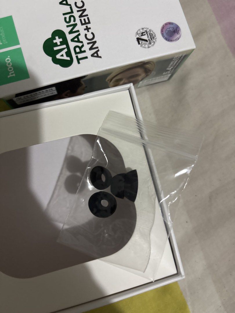 hoco smart ai earbuds (Category: Earphones) located in Manila. Submitted by iyahpreloved_ (Listing ID 1468610659, Image 3). Description: type c charger or swap to apple wired earphones :)).