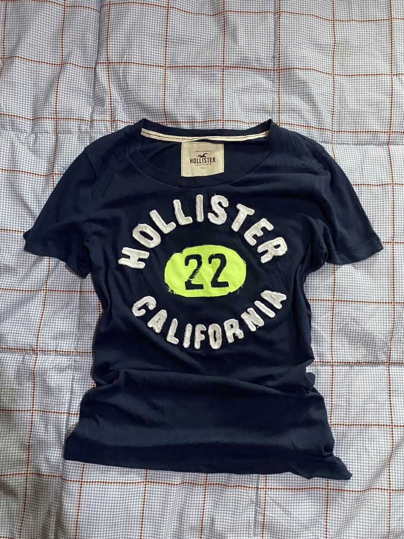 Hollister Spellout Tee (Category: Shirts) located in General Santos City (Dadiangas). Submitted by versatile__ (Listing ID 1468583160, Image 1). Description: Hollister Spell Out Tee Tagged as Medium width : 16 inches length : 25 inches Good Condition- Nine out of Ten Color Rate Featuring Spell out Design on Front Area -Need Wash! +Shipping Fee.
