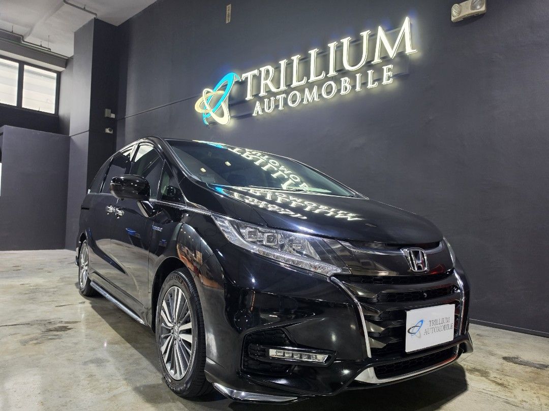 Honda Odyssey Hybrid 2.0 Absolute 8-Seater Honda Sensing (A) (Category: Used Cars) located in Singapore. Submitted by trillium.auto (Listing ID 1468557207, Image 2). Description: 🚘 Vehicle Features Powered by 2.OL 4 cylinders DOHC e-HEV Hybrid engine, producing 145ps 6200rpm engine power and 184ps 5-600Orpm motor power. E-CVT gearbox 🚘 Accessories Factory fitted infotainment system, dual power sliding door, brake hold, eco mode, pre crash warni