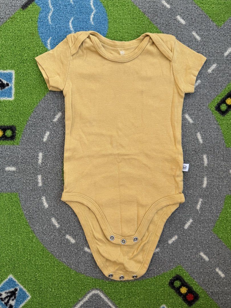 Honest Short Sleeve Bodysuit Onesie (Category: Babies & Kids Fashion) located in Rizal. Submitted by preloovved (Listing ID 1468591875, Image 1). Description: Simple solid mustard yellow baby bodysuit in soft cotton knit. Features short sleeves, crew neck, and bottom snap closures. Preloved, 3-6mos Meet-up only in GB1 San Mateo, Rizal Shipping fee c/o buyer. Tres Marias or J&T express Payment to be sent to me via BPI/BDO/GCASH only. 😁 C#.