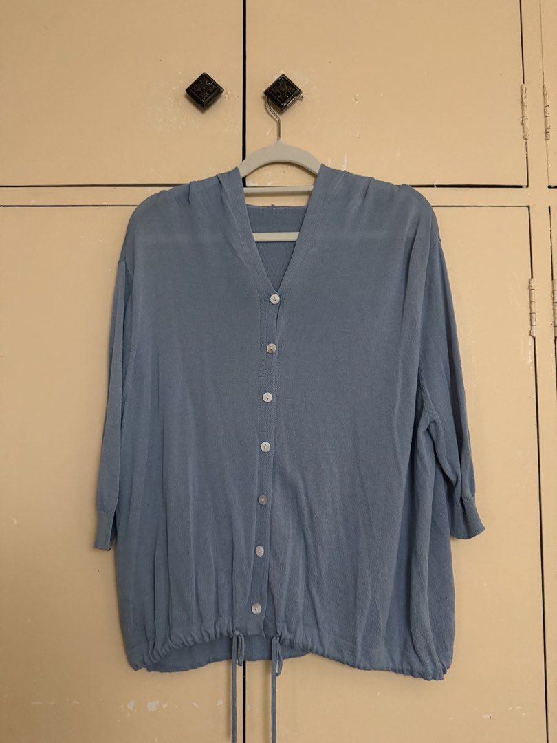 Hooded knitted button down top (Category: Blouses) located in Quezon City. Submitted by sufjanxcx (Listing ID 1468685825, Image 1). Description: Slightly thin material 3/4s sleeves Size XS-M.
