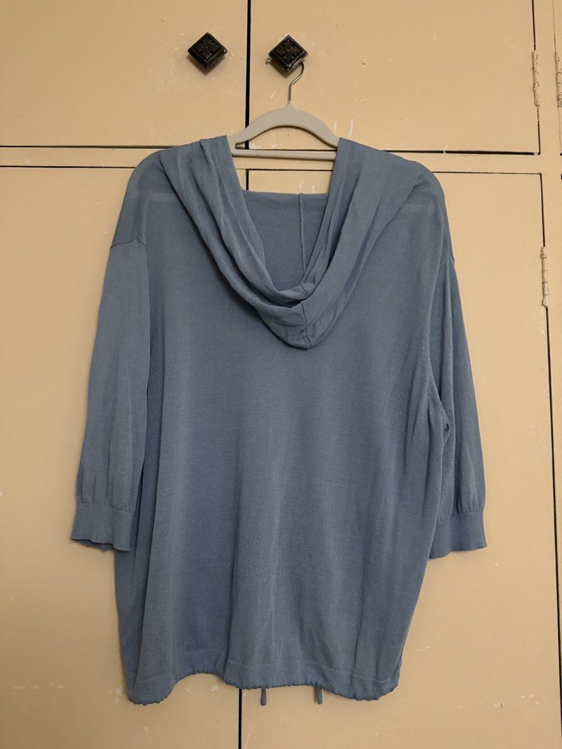 Hooded knitted button down top (Category: Blouses) located in Quezon City. Submitted by sufjanxcx (Listing ID 1468685825, Image 2). Description: Slightly thin material 3/4s sleeves Size XS-M.