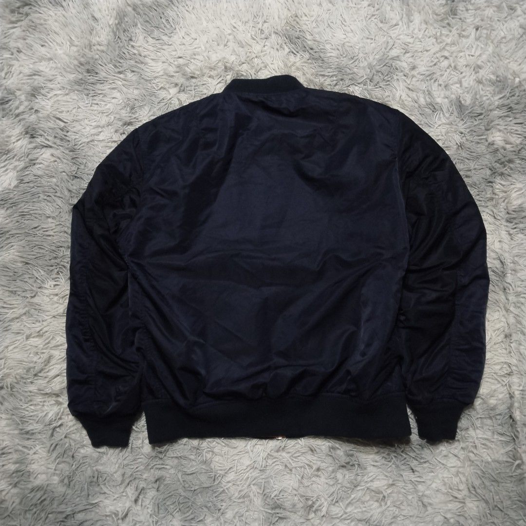 HOUSTON MA-1 FLIGHT BOMBER JACKET (Category: Coats, Jackets and Outerwear) located in Dasmarinas. Submitted by oneofakind_98 (Listing ID 1468676212, Image 3). Description: HOUSTON MA-1 FLIGHT BOMBER JACKET - Navy - Reversible - Like new condition Measurement when Iaid flat Size Extra Large on tag 22 inches armpit to armpit 27 inches length 24 inches sleeve 19.5 inches shoulder to shoulder 19 inches chest 3000 shipped via JNT.