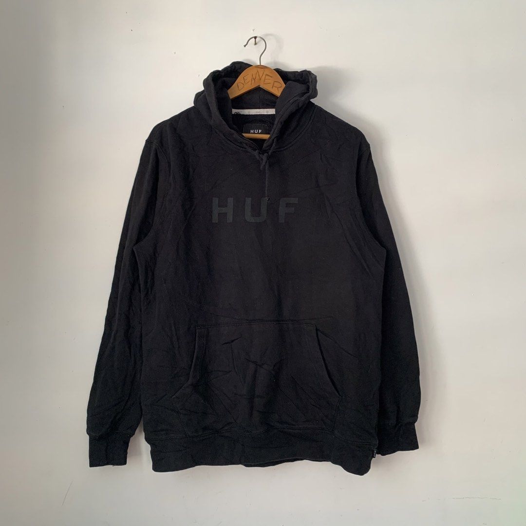 HUF Black Pullover Hoodie with Chest Logo Size M (Category: Hoodies) located in Manila. Submitted by gentleflower-74686a (Listing ID 1468502991, Image 1). Description: - Brand: HUF - 22 x 27 - Color: Black - Size: Medium - Material: 80% Cotton, 20% Polyester - Design: Large tonal HUF logo on chest - Features: Front kangaroo pocket, drawstring hood, ribbed cuffs and hem - Condition: Casual streetwear staple, comfortable fit - Details: Small woven 