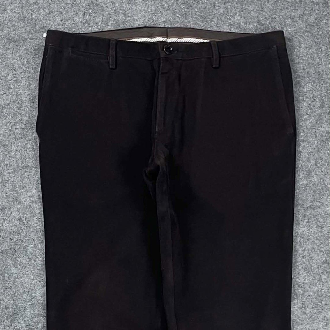 Hugo Boss choco brown slim-fit trousers (Category: Trousers) located in Zamboanga. Submitted by rag_20 (Listing ID 1468549072, Image 2). Description: Hugo Boss choco brown slim-fit trousers a classic staple for smart-casual and formal wear. Crafted with clean stitching, minimal branding, and a structured mid-rise waist, these pants bridge the gap between polished dress slacks and casual everyday wear. size: 34 17 Waist 11 Front rise 12 Thigh 41 L