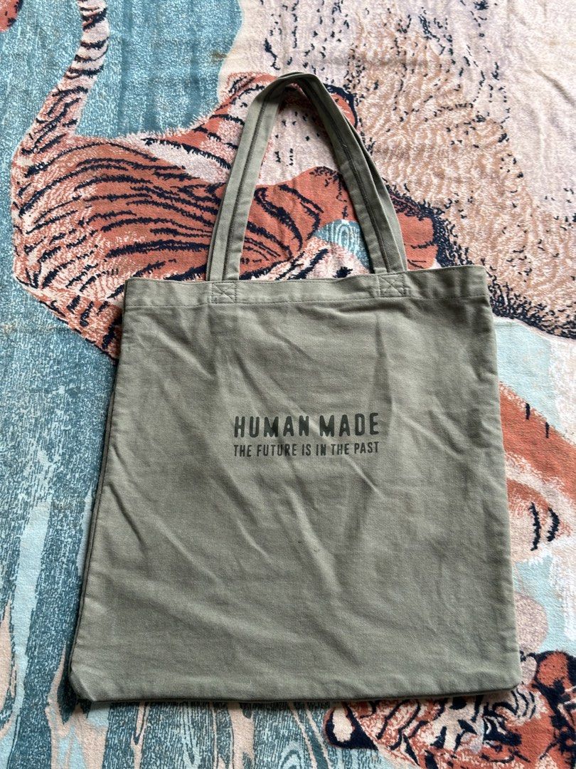 Human Made Book tote bag olive drab (Category: Luxury Bags & Wallets) located in Los Banos. Submitted by streetwear.collections (Listing ID 1468641866, Image 2). Description: Human Made Book tote bag olive drab Excellent condish Php 3500 Thanks!.