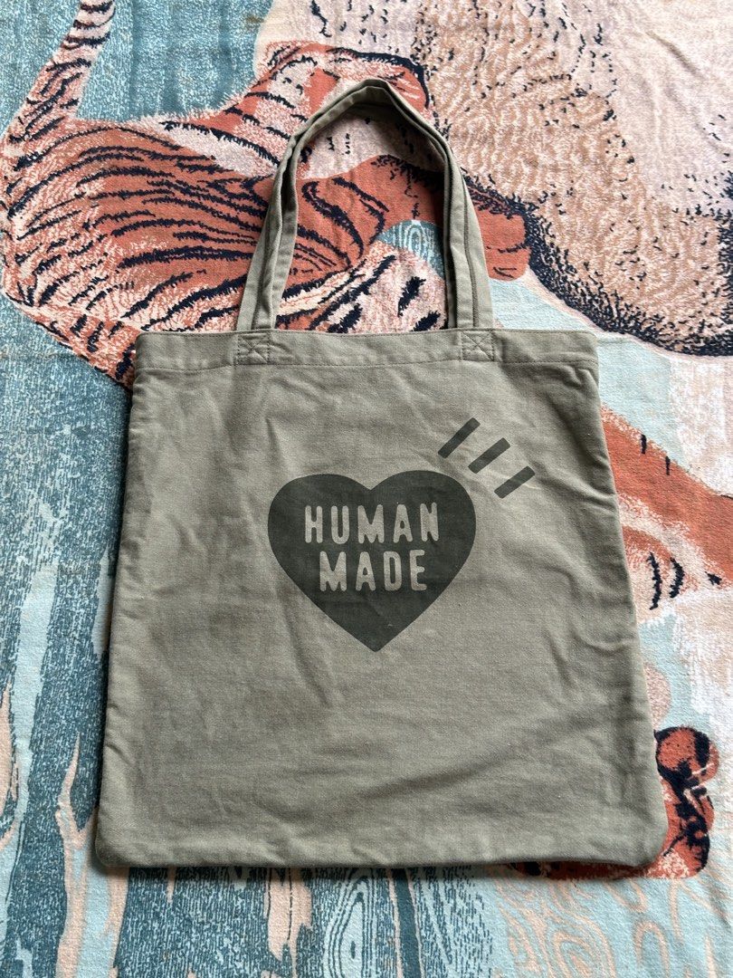 Human Made Book tote bag olive drab (Category: Luxury Bags & Wallets) located in Los Banos. Submitted by streetwear.collections (Listing ID 1468641866, Image 1). Description: Human Made Book tote bag olive drab Excellent condish Php 3500 Thanks!.