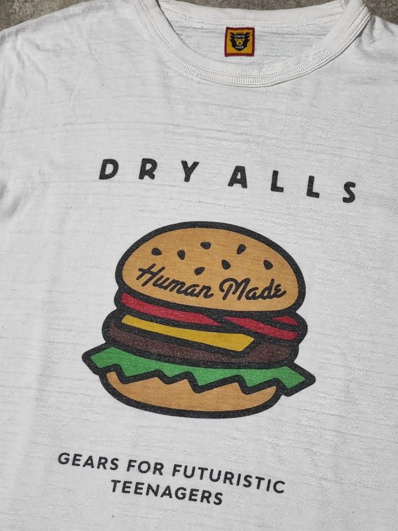 HUMAN MADE DRYALLS BURGER TEE (Category: Tshirts & Polo Shirts ) located in Iloilo. Submitted by gooddimes (Listing ID 1468690964, Image 3). Description: Human Made Dryalls Burger Tee Authentic Fresh from bale Size on tag: Large Dimes: 22x28L Issue/s: Minimal lints Color rate: 9.5/10 Good condition ₱2,200 +Shipping fee Reminders: - All items are thrifted, please manage your expectations - Color may vary due to lighting - Please wash before using 
