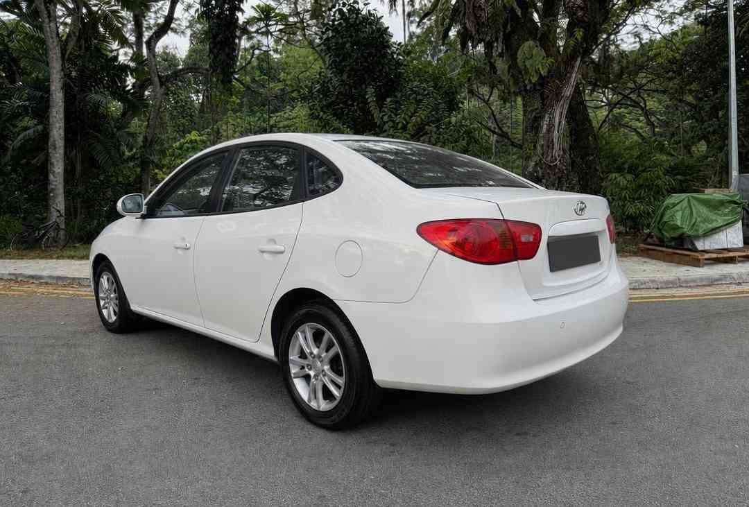 Hyundai Avante 1.6 (A) (Category: Used Cars) located in Singapore. Submitted by carousell_certified_partners (Listing ID 1462720344, Image 3). Description: White on Black Avante! Cheapest in sg! Good condition! Nice Number Plate! 100% full loan available! PHV loan available! We are authorised car loan agent for major banks and finance company since 2009! Buy with confidence! In house or bank loan available! All our vehicles has undergone a 120 po