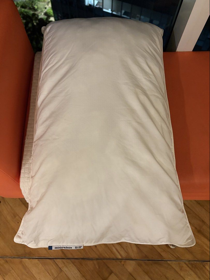 IKEA SKOGSFRÄKEN Pillow (Category: Cushions & Throws) located in Makati City. Submitted by chloudyday (Listing ID 1468687640, Image 3). Description: IKEA SKOGSFRÄKEN, White, w/ original product tag attached on the corner. Issue: Recently had it cleaned in a laundry shop but it came back soft and not as firm as it used to be. .