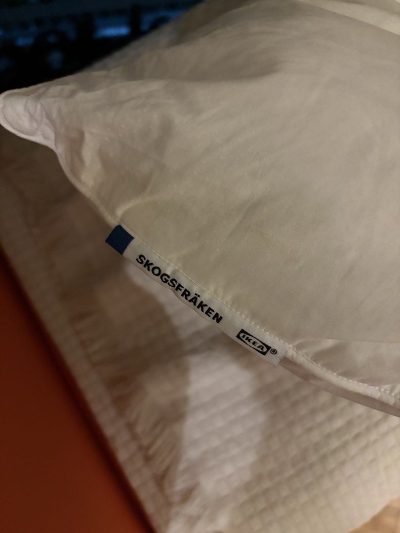 IKEA SKOGSFRÄKEN Pillow (Category: Cushions & Throws) located in Makati City. Submitted by chloudyday (Listing ID 1468687640, Image 1). Description: IKEA SKOGSFRÄKEN, White, w/ original product tag attached on the corner. Issue: Recently had it cleaned in a laundry shop but it came back soft and not as firm as it used to be. .