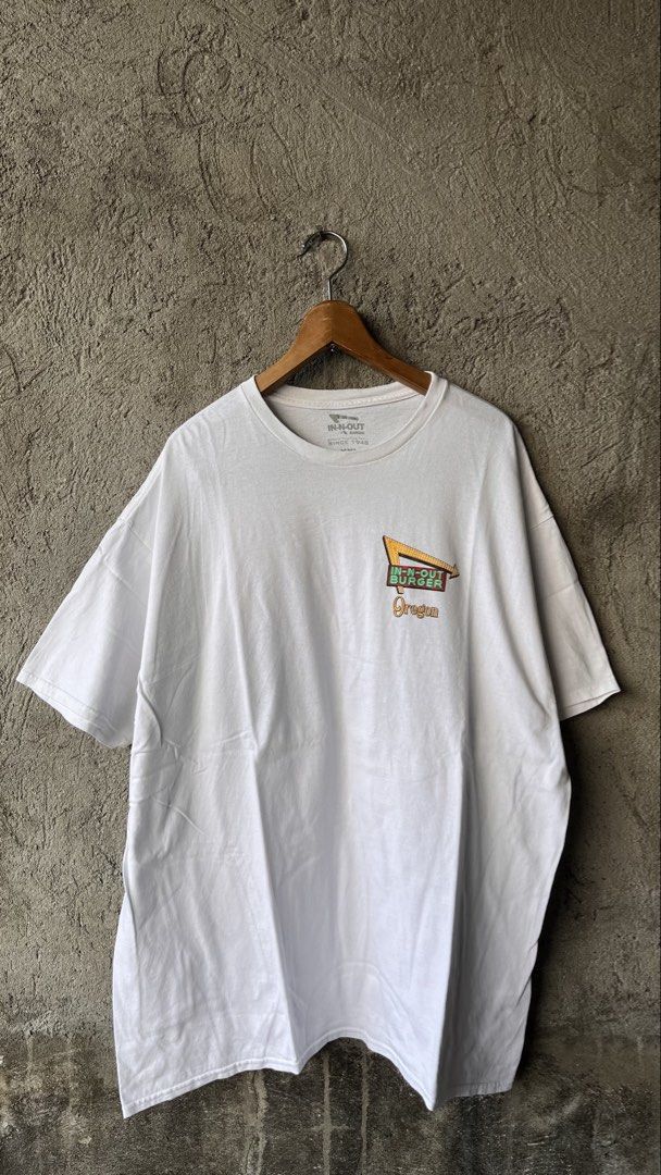 In-N-Out Burger Oregon Graphic Tee (Category: Tshirts & Polo Shirts ) located in Cabuyao City. Submitted by bulandos (Listing ID 1468637737, Image 2). Description: - Brand/Item: White In-N-Out Burger T-Shirt (Oregon Exclusive) - Size: XXL (Regular fit) - Design: Small neon chest graphic, large vintage car & restaurant sunset artwork on the back - Material: 100% cotton, pre-shrunk (Made in Honduras) - Perfect for streetwear, collectors, and In-N-O