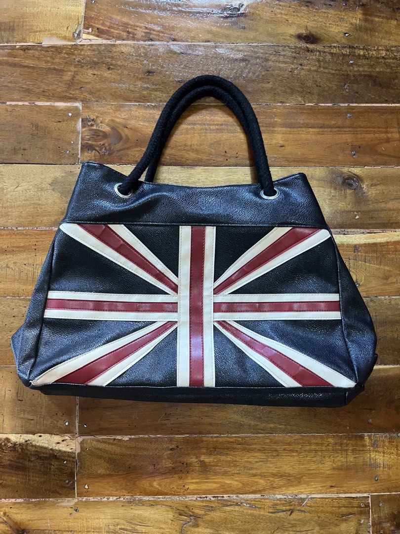 Inspired black UK bag (Category: Shoulder Bags) located in Manila. Submitted by cjzgarments_ (Listing ID 1468526369, Image 1). Description: Leather .
