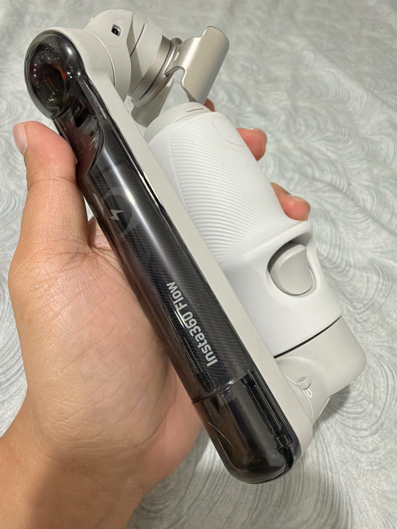 Insta360 Flow AI-Powered Smartphone Stabilizer (Category: Gimbals & Stabilizers ) located in Manila. Submitted by maxxxx.91 (Listing ID 1468635295, Image 1). Description: - Compact & Foldable: Easily slips into your bag or pocket for ultimate portability. - Built-in Extension Rod & Tripod: Perfect for selfies, vlogs, and steady group shots. - Sleek Design: Stylish white handle with a textured grip and a dark transparent case section. - Intuitive 