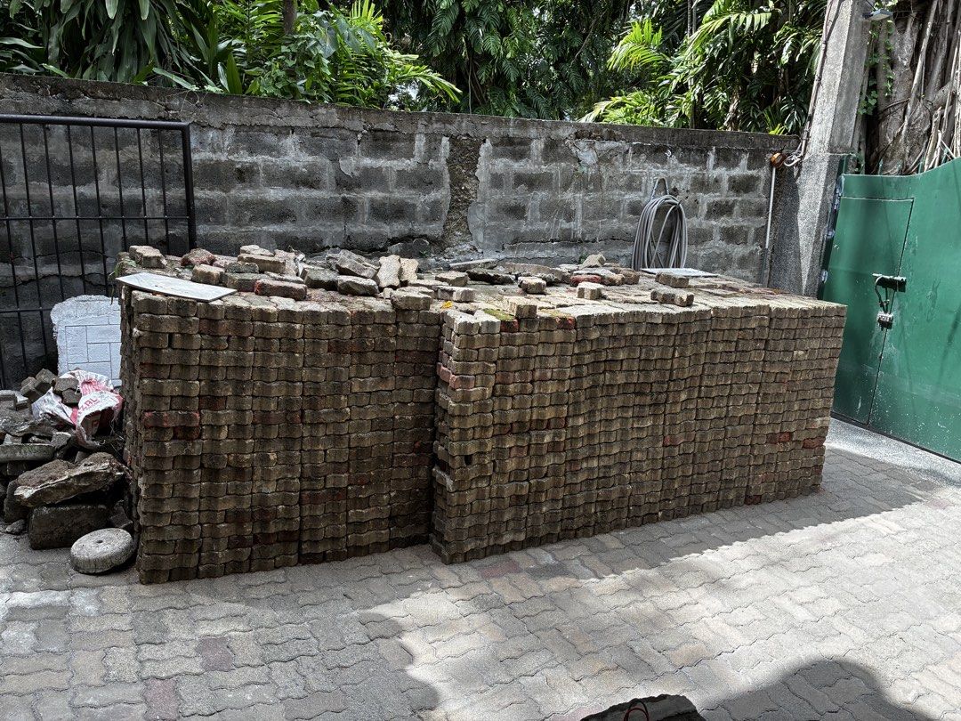 Interlocking Paving Blocks Bricks Stacked Outdoor Pavers (Category: Construction & Building Materials) located in Paranaque City. Submitted by ocgenanga (Listing ID 1468538786, Image 1). Description: For free while there is stock! Loc: Muntinlupa - Product: Solid and durable concrete interlocking paving blocks - Color/Style: Standard greyish-brown paver bricks - Ideal For: Driveway, patio, or walkway projects - Condition: Neatly stacked outdoors 