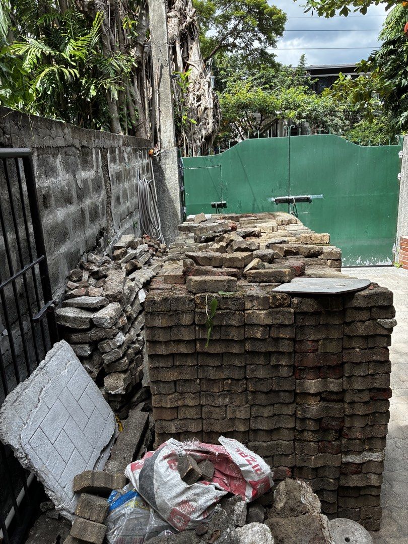 Interlocking Paving Blocks Bricks Stacked Outdoor Pavers (Category: Construction & Building Materials) located in Paranaque City. Submitted by ocgenanga (Listing ID 1468538786, Image 2). Description: For free while there is stock! Loc: Muntinlupa - Product: Solid and durable concrete interlocking paving blocks - Color/Style: Standard greyish-brown paver bricks - Ideal For: Driveway, patio, or walkway projects - Condition: Neatly stacked outdoors 