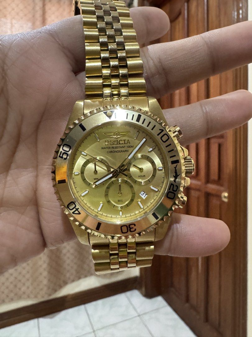Invicta Pro Diver Chronograph Gold Tone 43mm (Ref. 48382) (Category: Men's Watches) located in Iloilo. Submitted by segundo.ilonggo (Listing ID 1468594888, Image 3). Description: Key Features & Specifications Brand & Line: Invicta Pro Diver Series Model / Ref. Number: 48382 Movement: Japanese Quartz Chronograph Movement Case Diameter: 43 mm Case & Bracelet: Full Gold-Tone Stainless Steel (Jubilee-style bracelet) Dial: Champagne Gold Sunray Dial w