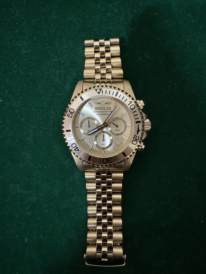 Invicta Pro Diver Chronograph Gold Tone 43mm (Ref. 48382) (Category: Men's Watches) located in Iloilo. Submitted by segundo.ilonggo (Listing ID 1468594888, Image 2). Description: Key Features & Specifications Brand & Line: Invicta Pro Diver Series Model / Ref. Number: 48382 Movement: Japanese Quartz Chronograph Movement Case Diameter: 43 mm Case & Bracelet: Full Gold-Tone Stainless Steel (Jubilee-style bracelet) Dial: Champagne Gold Sunray Dial w