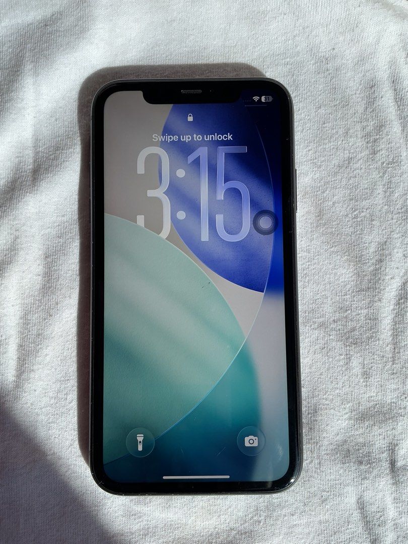 IPhone 11 (Category: iPhone 11 Series) located in San Fernando. Submitted by keysjeyshop (Listing ID 1468615418, Image 2). Description: IPHONE 11 68gb Black ₱7.5k (nego for sure buyer) 80%BH (orig batt ) ios 26.5 wife used only no history of repair inclusion: unit,charger&case ✅face id & true tone works ✅unli reset issue: may few scratches sa screen at paint chip sa camera..