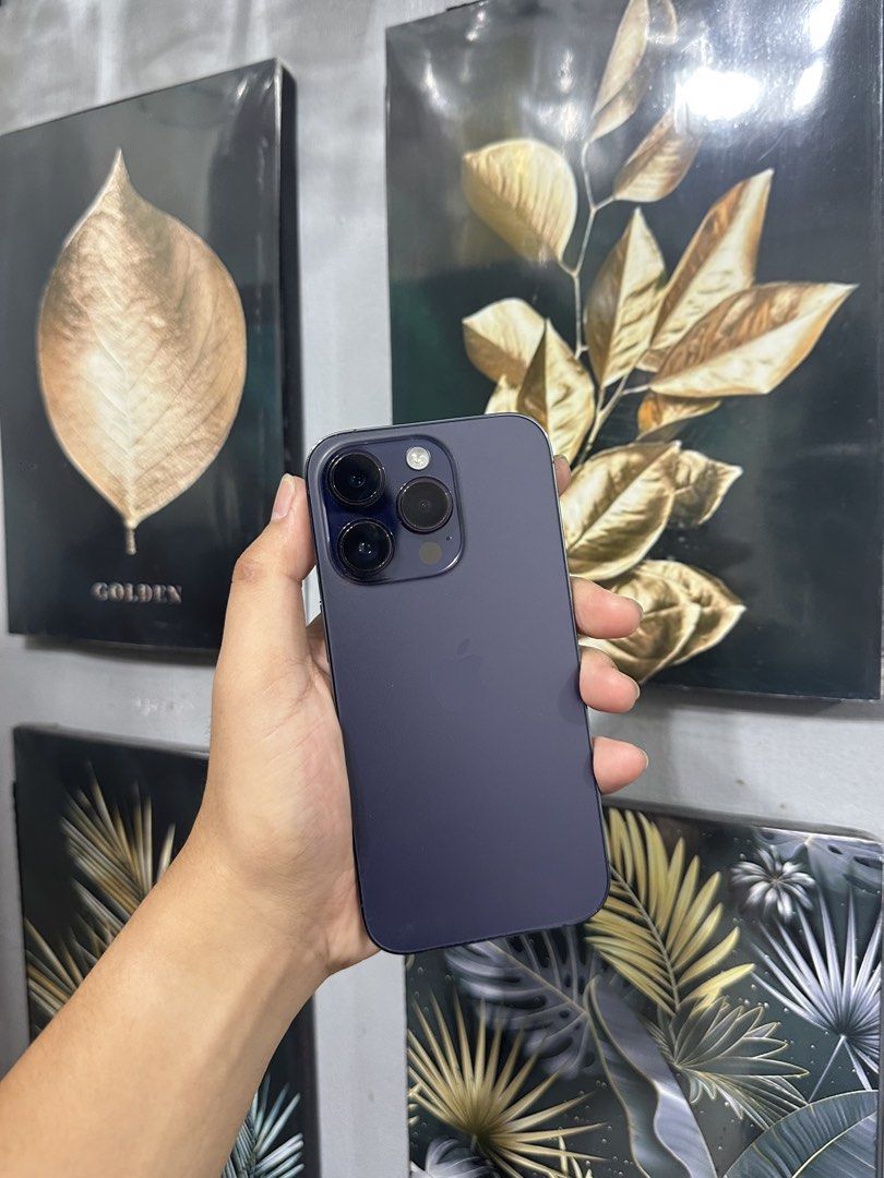 iPhone 14 Pro 256GB (Category: iPhone 14 Series) located in Manila. Submitted by Drewy (Listing ID 1468693071, Image 1). Description: For Sale 26k or Swap iPhone 14 Pro ( Deep Purple ) 256GB, Any Sim. NTC Approved 100BH, IOS 27.0 No Issue, Minor Scratches With Case Only Installed Tempered Glass.