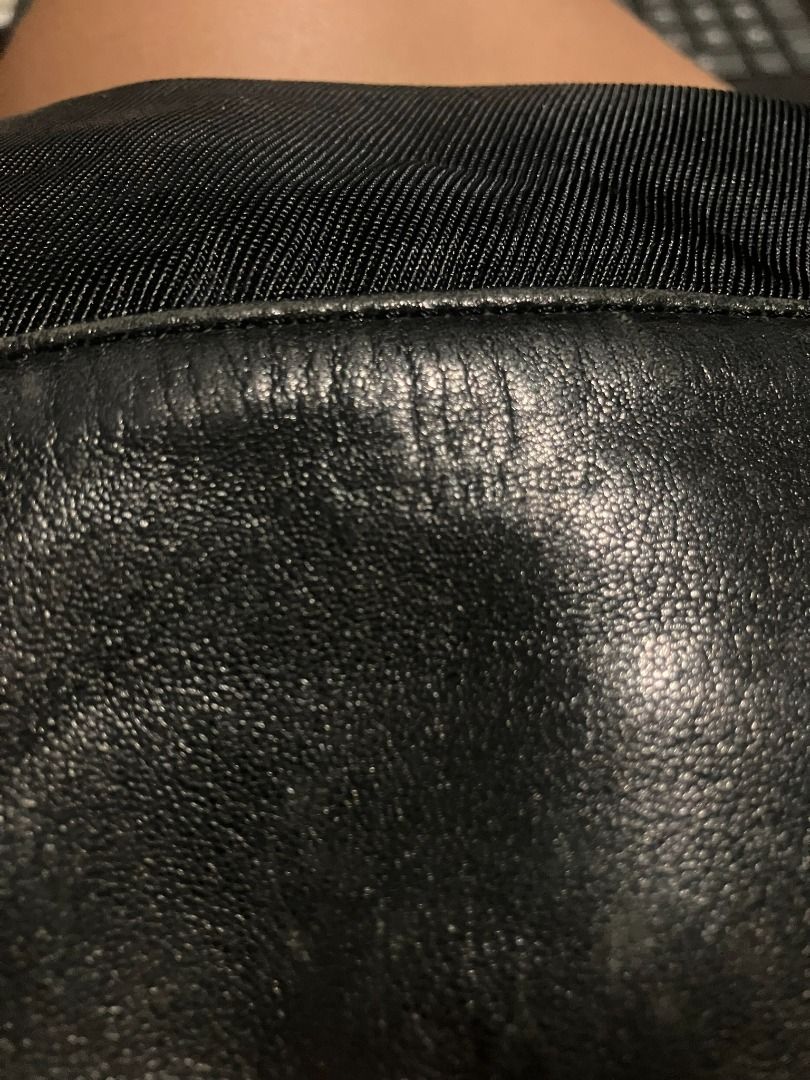 ISSEY MIYAKE Black Nylon & Leather Drawstring Bag (Category: Luxury Bags & Wallets) located in Manila. Submitted by nellyfrustrado (Listing ID 1468586756, Image 3). Description: authentic vintage I.M Issey Miyake drawstring shoulder bag / backpack in black. Designed with a high-grade nylon body and rich genuine leather accents at the top cinch collar, leather base panel, and strap pull-tabs. Features an embossed “I.M Issey Miyake” logo on the fro