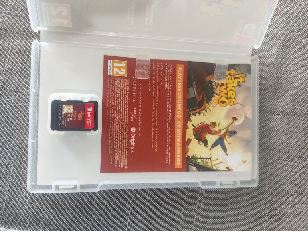 It Takes Two Nintendo Switch Game Card and Case (Category: Nintendo) located in Valenzuela. Submitted by jthlcs (Listing ID 1468528790, Image 2). Description: - Platform: Nintendo Switch (Physical game cartridge in original case with booklet) - Genre: Award-winning cooperative game - Players: Perfect 2-player couch co-op experience - Rating: PEGI 12 (Internet download required to play).