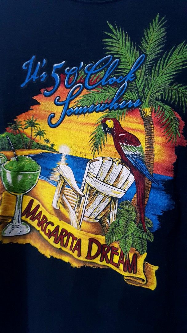 It's 5 O'Clock Somewhere Margarita Dream (Category: Tshirts & Polo Shirts ) located in Taguig. Submitted by wethrifting2021 (Listing ID 1468662875, Image 2). Description: Item: Its 5 Oclock Somewhere (Margarita Dream)🔥 Size: Gildan Heavy Cotton (M) Width: 19.5 Length: 26 Condition: Excellent Issue: Crack print, Paint stain on back SWIPE MORE DETAILS. DM to purchase 📩.