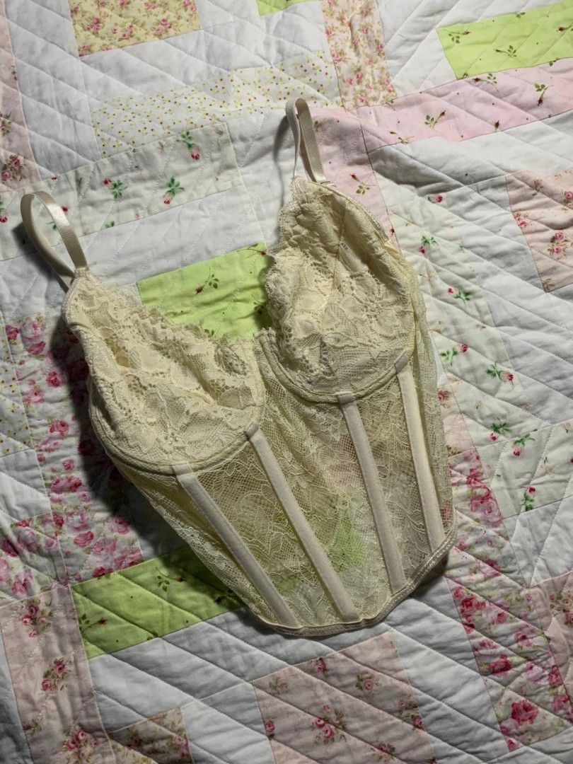Ivory Lace Corset Top (Category: Others Tops) located in Paranaque City. Submitted by dayiiee (Listing ID 1468695918, Image 1). Description: ivory/cream lace corset top with delicate floral lace details, structured cups, and boning accents for a flattering silhouette. Features adjustable shoulder straps and a sheer lace design, perfect for a coquette, elegant, or feminine outfit. Size: XS-S 🤍 Color: Ivory/Cream ✨ Style: Lace Corset / Coquette / 