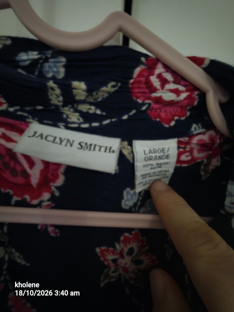 Jaclyn Smith Navy Blue Floral Button Down Blouse Large (Category: Blouses) located in Puerto Princesa. Submitted by kholene (Listing ID 1468704727, Image 2). Description: - Brand: Jaclyn Smith - Style: Short-sleeve button-down shirt with classic collar - Size: Large - Color/Pattern: Navy blue base with all-over pink, red, white, and blue floral print - Material: Lightweight rayon - Condition: Great for casual everyday wear.