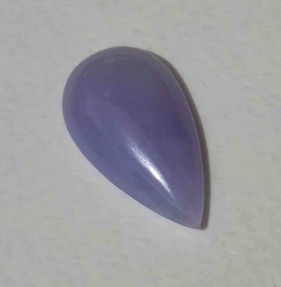 Jadeite pear cut loose cabochon (Category: Precious Stones) located in Bacoor. Submitted by jadeitemaster (Listing ID 1468650616, Image 2). Description: This is a rare, lavander pear cut or tear drop shape. Intense purple or lavander color under natural light. 3.2grams approximately 16carats Natural type A, with certificate. Will be gorgeous when set in 18k ring or pendant..