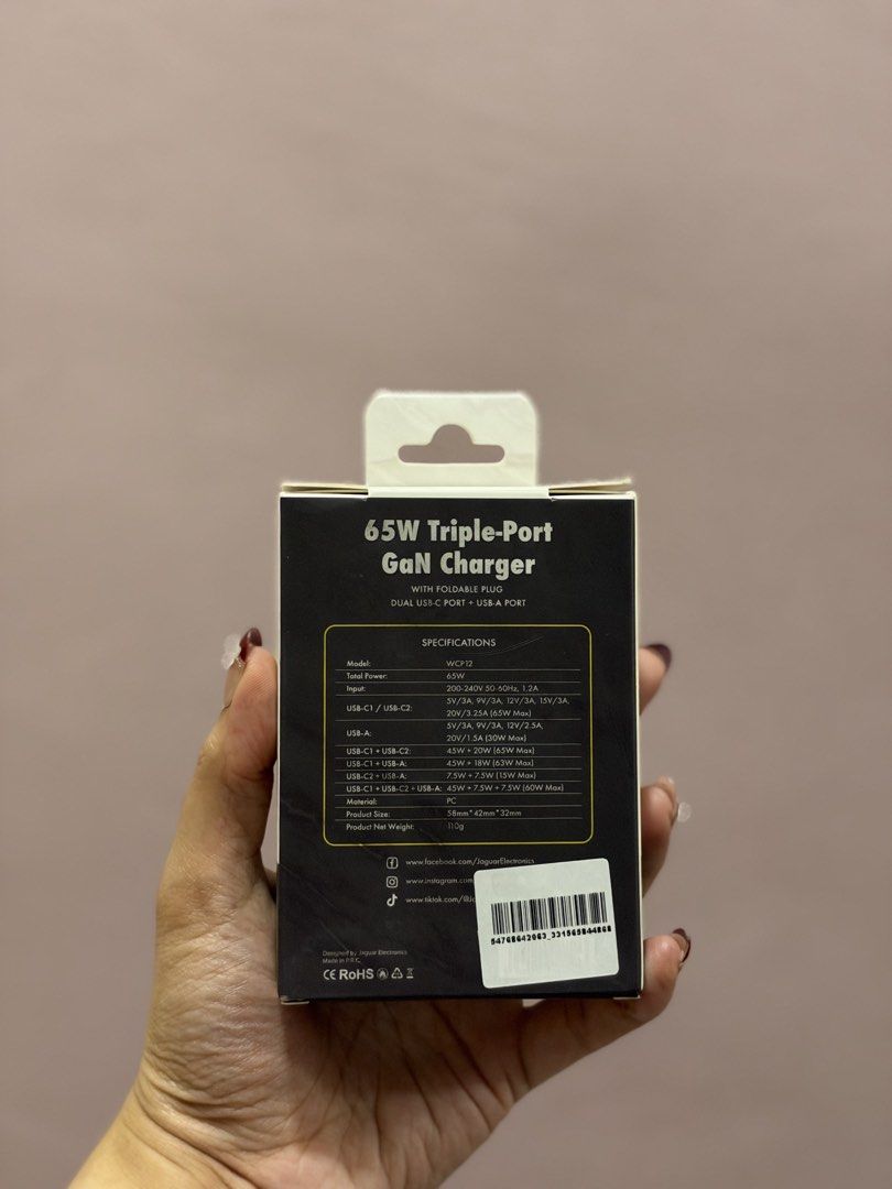 Jaguar 65W Triple-Port Adaptor (Category: Cables & Adaptors) located in Dasmarinas. Submitted by maarryyaannnn (Listing ID 1468707320, Image 3). Description: - Brand: Jaguar Electronics - Model: WCP12 - Power Output: 65W Ultra-Fast Charging with Smart PPS Technology - Ports: Dual USB-C and Single USB-A (Triple-Port) - Design: Compact with foldable plug, easy for travel - Condition: Brand new in original packaging.