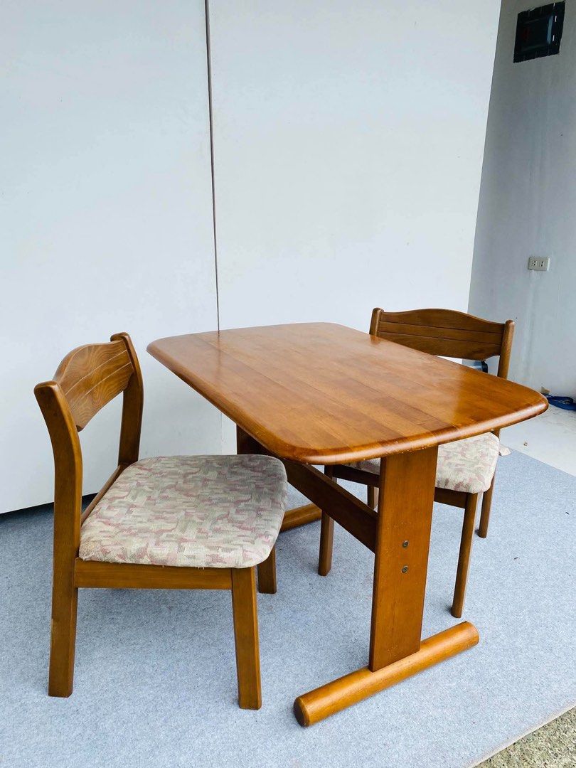 “JAPAN SURPLUS” 2-SEATER SOLID WOOD DINING SET (Category: Tables & Sets) located in Bulacan. Submitted by monmon555 (Listing ID 1468677394, Image 3). Description: “JAPAN SURPLUS” 2-SEATER SOLID WOOD DINING SET SIZE: 37L” x 25W” x 27H” inches 18L” x 18W” x 16Sh” x 30H” inches (AS-IS ITEM) IN GOOD CONDITION.
