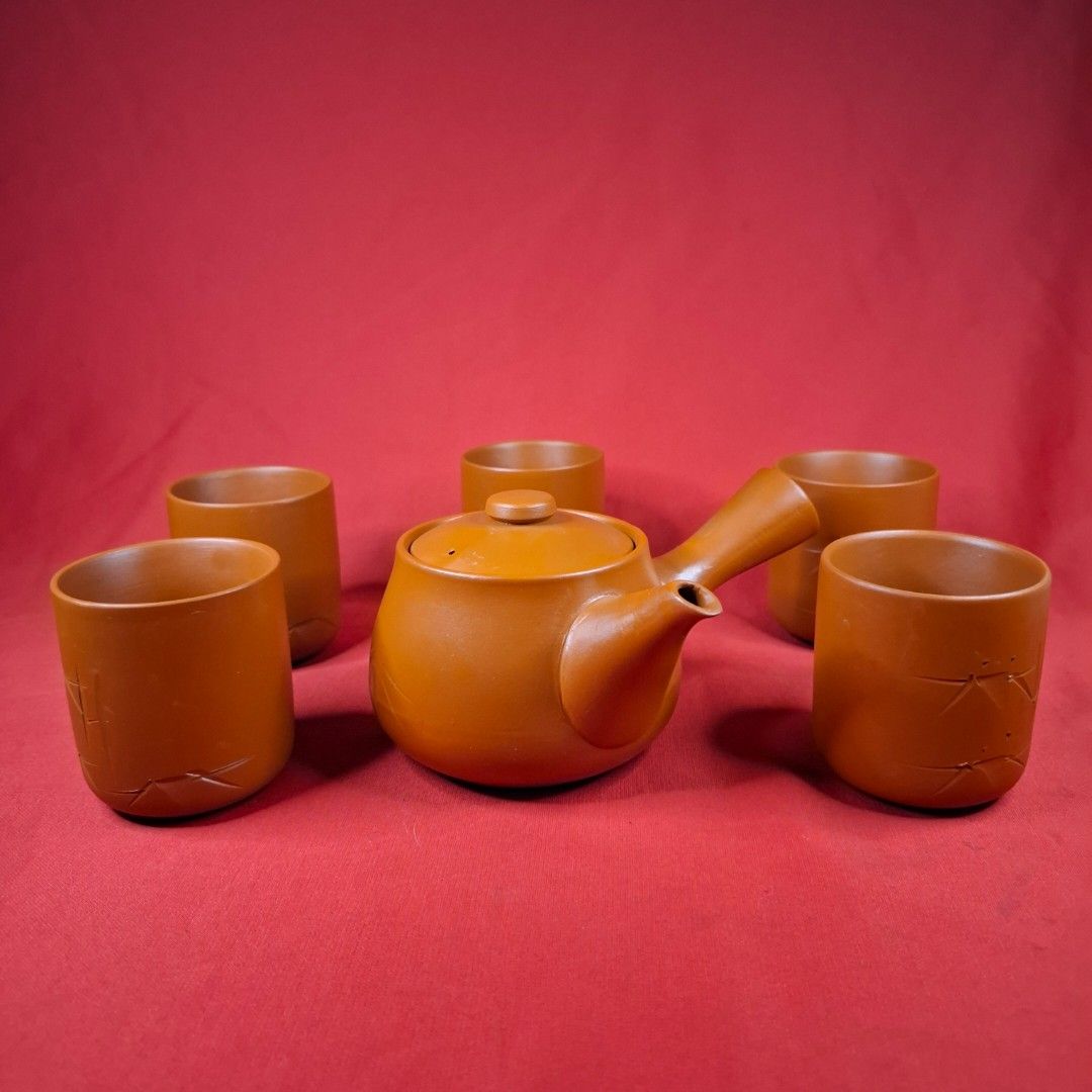 Japanese Kyusu Teapot Set with Five Teacups (Category: Coffee & Tea Tableware) located in Mandaluyong City. Submitted by edward123_andren (Listing ID 1468708073, Image 1). Description: - Traditional Japanese clay tea set in a rich terracotta brown finish - Includes one kyusu side-handle teapot and five matching teacups - Compact size ideal for solo brewing or small gatherings - Perfect for authentic green tea or matcha sessions.