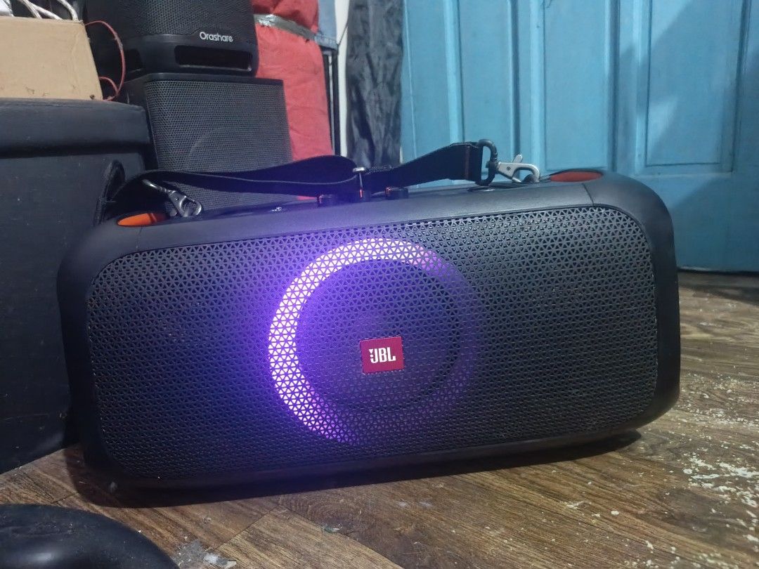 JBL on the go (Category: Soundbars, Speakers & Amplifiers) located in Manila. Submitted by chard27re10854 (Listing ID 1468594015, Image 1). Description: - Authentic JBL PartyBox Encore portable party speaker - Includes original branded shoulder strap - Top control panel with knobs for bass, treble, echo, and volume, plus Bluetooth and power - Rear panel equipped with AC power input, USB port, and aux jack - Serial number sticker intact near ports