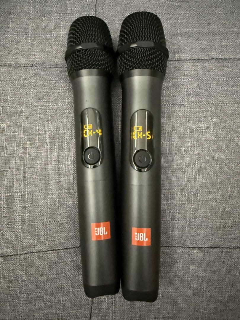 JBL Wireless Microphone Set (Category: Microphones) located in Pasay City. Submitted by el.sole (Listing ID 1468569852, Image 2). Description: 👉ORIGINAL JBL MICROPHONE 👉We can meet and check the item 😊 👉DECLUTTER - 100% working and tested JBL wireless microphone set - Includes 2 handheld microphones and a wireless receiver - Built-in digital display on each mic shows channel and battery level - Stylish design with orange JBL logo on the lower