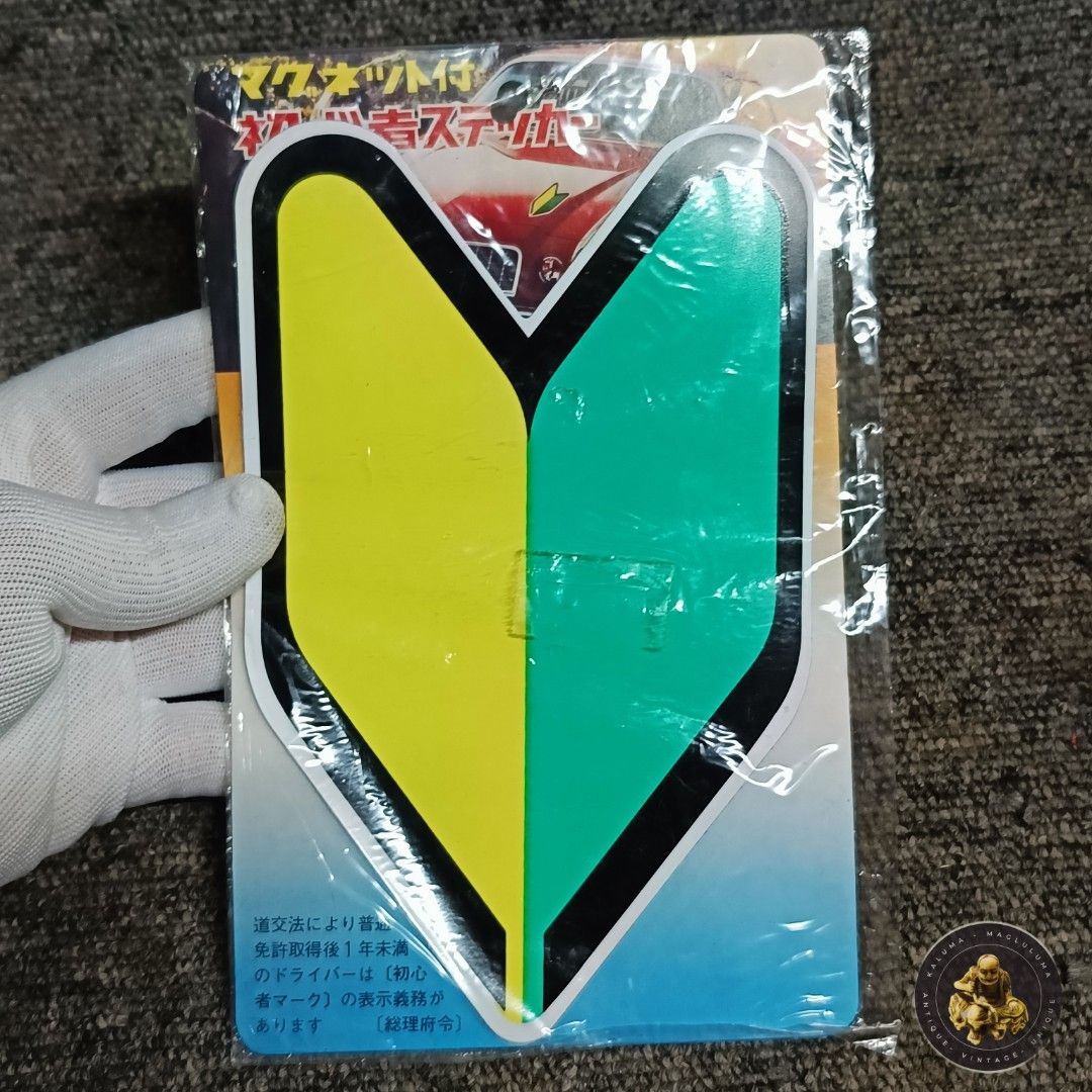 JDM Wakaba Shoshinsha Mark (Category: Vintage Collectibles) located in Meycauayan. Submitted by ka_luma (Listing ID 1468701626, Image 1). Description: Shoshinsha mark (also called the Wakaba or beginner's driver's mark) magnetic set, which is a green-and-yellow V-shaped badge required by Japanese law for new drivers who have held their license for less than a year..
