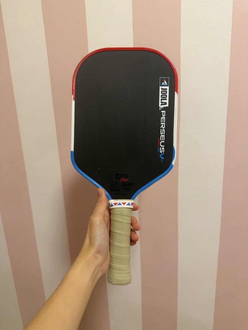 JOOLA Perseus V Pro 16mm Pickleball Paddle Pops Edition (Category: Racket and Ball Sports) located in Makati City. Submitted by onlineshopper21 (Listing ID 1468667438, Image 3). Description: JOOLA Perseus Pro 16mm (Pops Series) Inclusions: Comes with the matching popsicle cover, original plastic packaging and box Condition: Well-maintained Bought from Picklexchange Pampanga.