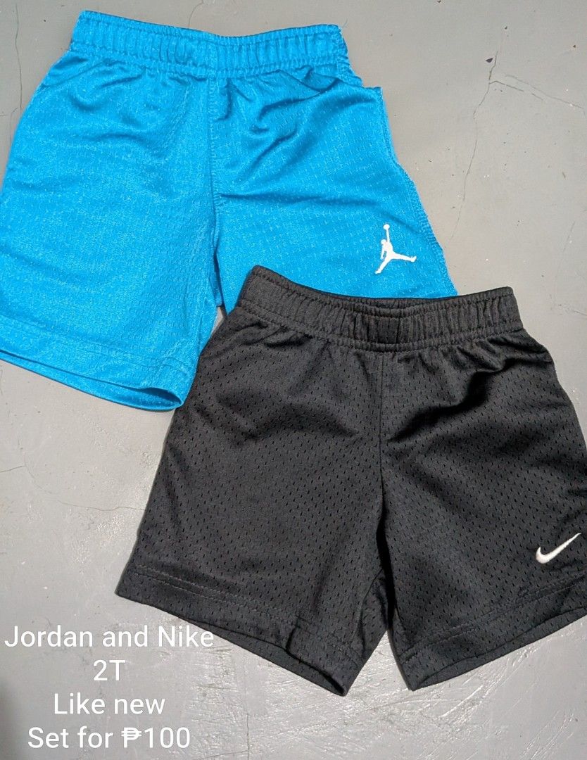 Jordan and Nike Shorts Set 2T (Category: Babies & Kids Fashion) located in Tanay. Submitted by misyelleysim (Listing ID 1468612914, Image 1). Description: - Bundle of 2 toddler athletic shorts (Blue with Jordan Jumpman logo, Black with Nike swoosh) - Made from breathable mesh fabric to keep active kids cool - Comfortable elastic waistband for a secure fit - Easy pull-on style for quick dressing - Great value bundle for everyday play.