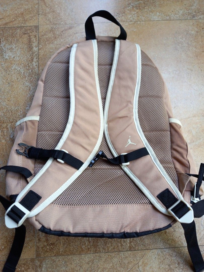 Jordan Jumpman Tan Backpack (Category: Backpacks) located in Davao. Submitted by kirk214red-50020 (Listing ID 1468530637, Image 3). Description: - Color: Tan - Iconic Jumpman logo and branded webbing strap on the front - Multiple zipper compartments for easy organization - Dedicated interior laptop sleeve and organizer pockets - Padded mesh back and shoulder straps for all-day comfort - Clean interior lining with original tag intact.