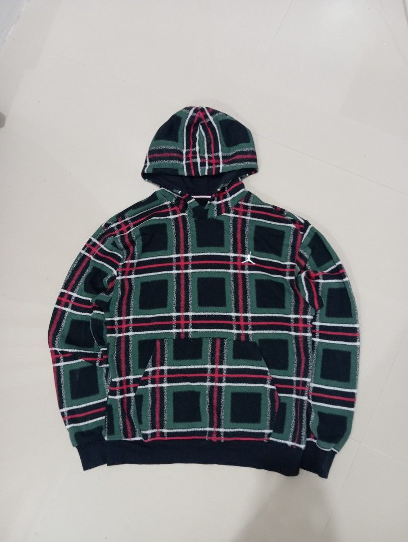 Jordan Plaid Fleece Pullover Hoodie (Category: Hoodies) located in Guihulngan. Submitted by jaylordfra13193 (Listing ID 1468682417, Image 1). Description: - Brand: Jordan - Size: Medium - Colorway: Green, black, and red plaid - Material: 80% cotton, 20% polyester (Made in Vietnam) - Design: Embroidered white Jumpman logo on chest, kangaroo front pocket, adjustable hood - Fit/Feel: Warm heavyweight fabric, cozy fit, ribbed cuffs and hem - Style: G