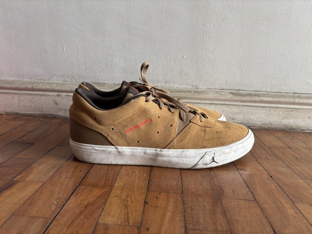 Jordan Series ES "Elemental Gold (Category: Sneakers) located in Manila. Submitted by kendrickda88641 (Listing ID 1468567601, Image 2). Description: - Brown suede upper with matching inner lining and laces - Iconic red Jumpman logo on the tongue and lateral side - Thick white rubber soles (with light scuffing on sides and bottom) - Maintained clean overall shape - Stylish low-top fit, perfect for daily wear.