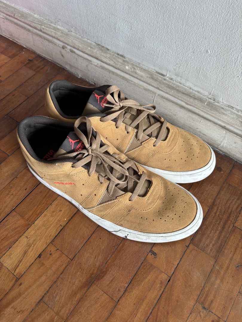 Jordan Series ES "Elemental Gold (Category: Sneakers) located in Manila. Submitted by kendrickda88641 (Listing ID 1468567601, Image 1). Description: - Brown suede upper with matching inner lining and laces - Iconic red Jumpman logo on the tongue and lateral side - Thick white rubber soles (with light scuffing on sides and bottom) - Maintained clean overall shape - Stylish low-top fit, perfect for daily wear.