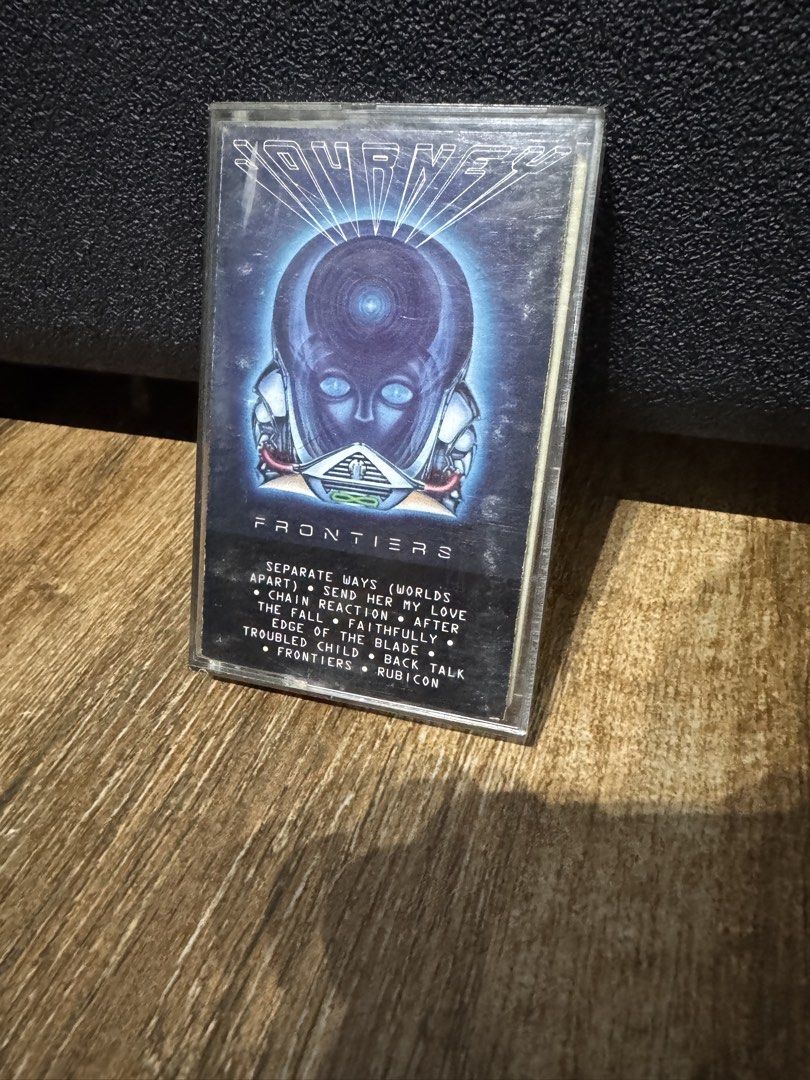 Journey Frontiers Cassette Tape (Category: CDs & DVDs) located in Cavite. Submitted by ms.cdjunkies (Listing ID 1468659265, Image 1). Description: - Album: Journey - Frontiers cassette tape - Hits: Includes 'Separate Ways', 'Faithfully', and 'Send Her My Love' - Condition: Original plastic case has minor scuffs from storage; tape label is clean and fully intact - Perfect for: Cassette collectors and classic rock fans.