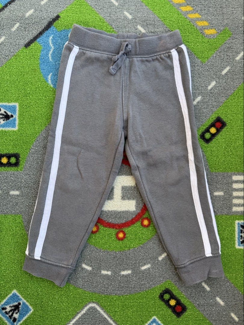 Jumping Beans Jogger Jogging Pants (Category: Babies & Kids Fashion) located in Rizal. Submitted by preloovved (Listing ID 1468584470, Image 1). Description: Comfortable grey sweatpants featuring classic white stripes, an adjustable drawstring waist, and ribbed cuffs. Made from soft cotton. Preloved, 2yo, may maliit na stain sa may garter Meet up only in GB1 San Mateo, Rizal Shipping fee c/o buyer. Tres Marias or J&T express Payment to be sent to