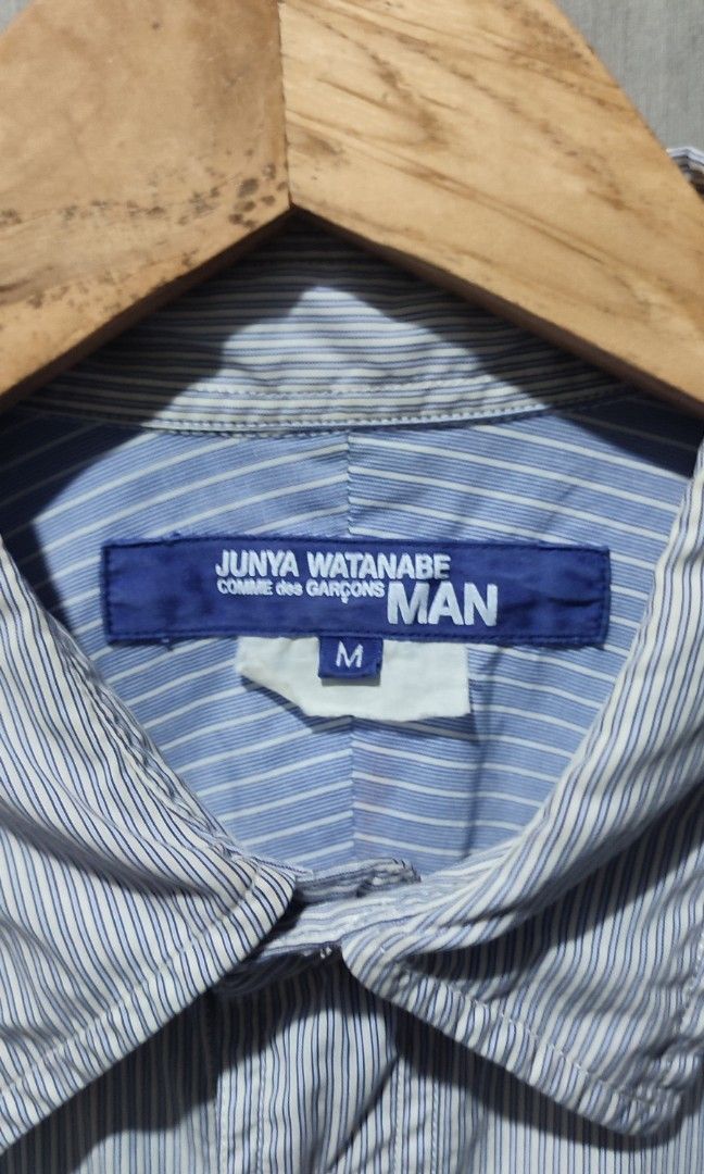 Junya Watanabe MAN Comme des Garçons Polo Button Down (Category: Formal Shirts) located in Solano. Submitted by johnpaulsanmiguel (Listing ID 1468609430, Image 3). Description: Junya Watanabe MAN Comme des Garçons Size M on tag Width 22 Length 27 (Back 29) Good excellent Minimal flaws stain last pic 9.7/10 Authentic.