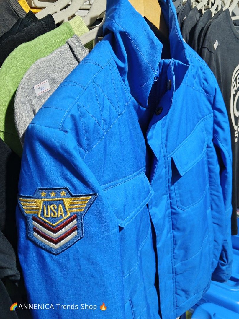 KAPPA USA PATCH BOMBER JACKET (Category: Coats, Jackets and Outerwear) located in Bulacan. Submitted by annenicathriftthriftlang (Listing ID 1468507523, Image 3). Description: *KAPPA USA PATCH BOMBER JACKET 💙✈️* *Size M on tag - P200 ONLY!* *DIMES:* - Width: 21-22 inch - Length: 26 inch - Sleeve: 24 inch - Shoulder: 18 inch - Fit: Medium to Large *CONDITION:* Excellent condition, no issue, embroidered patch, makapal tela *BEST FOR:* Pang motor, 
