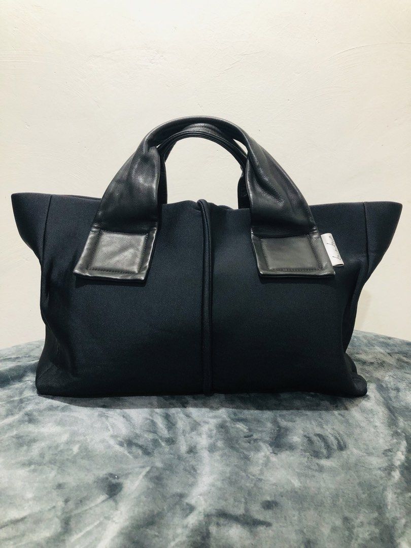 KAWA-KAWA TOTE/HAND BAG (Category: Tote Bags) located in Imus. Submitted by dhouseoftotes (Listing ID 1468627574, Image 2). Description: 📐 MEASUREMENTS‼️ H - 11 inches W - 16 inches D - 4 inches Drop - 4.5 inches FROM JAPAN! BODY MATERIAL: Wet/Scuba Fabric (Neoprene / Polyurethane Blend) INTERIOR MATERIAL: Nylon/Polyester HANDLE: Leather MAGNETIC CLOSURE 2-OPEN POCKETS INSIDE 1-ZIPPER POCKET INSIDE DISCLAIMER!! I am not affiliated, associated, a